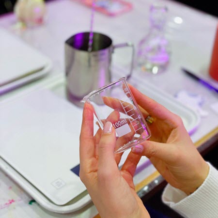 Lady Checking Candle Container